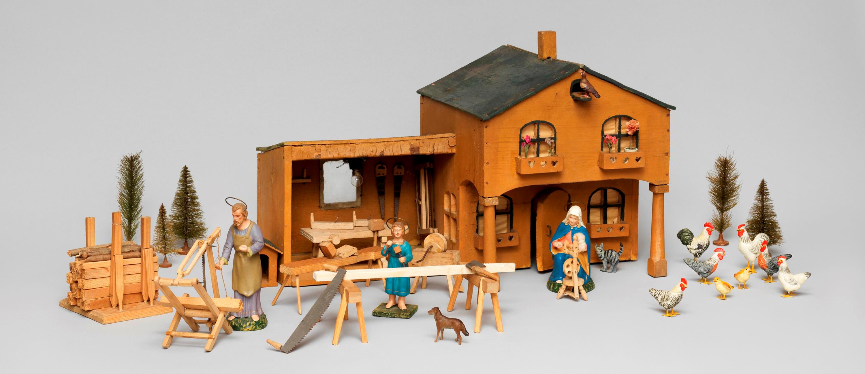 Krippenstall als Schreinerei mit Figuren